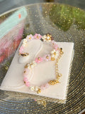 pink floral beaded bracelet with gold accents